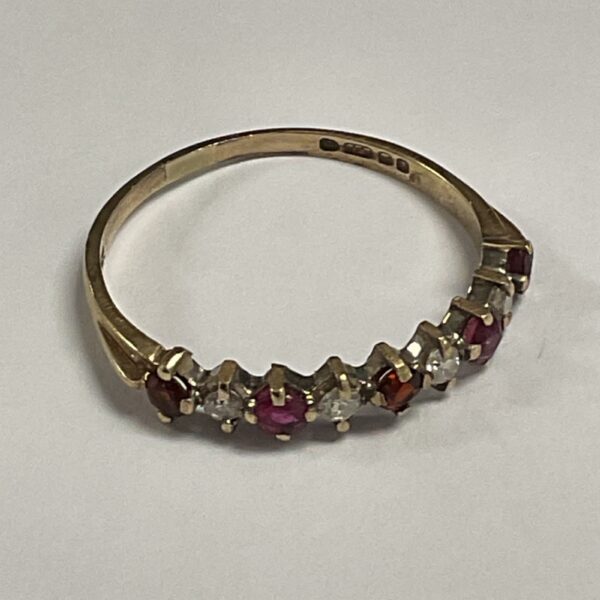 9ct gold ring with rubies and diamonds, hallmarked and in good condition.
