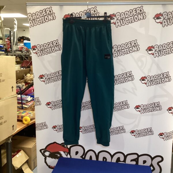 Adidas tracksuit bottoms size M, classic sportswear for fitness.