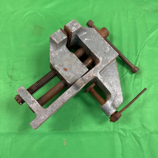 Vintage aluminium bench vice for workshop use.