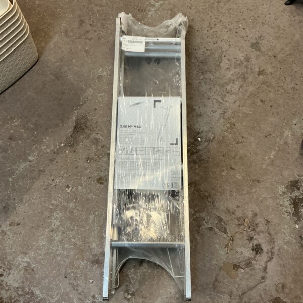 Folded aluminium loft ladder ready for storage or installation.