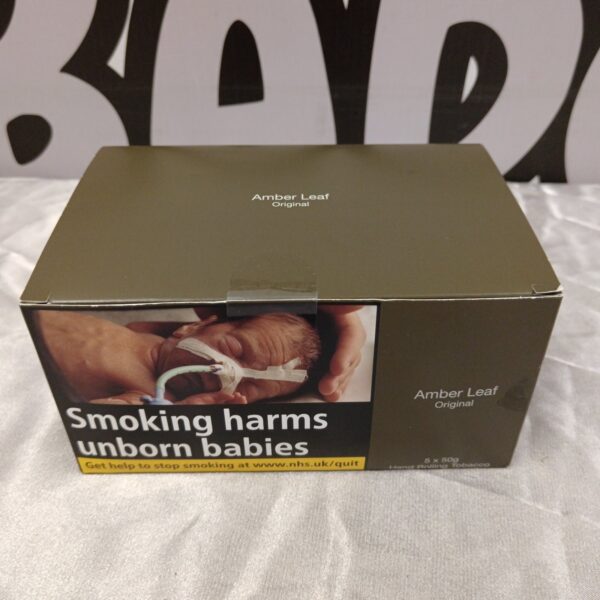 Sealed pouch of Amber Leaf rolling tobacco, collectible smoker's item.