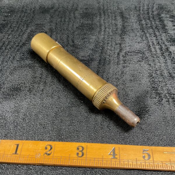 Antique brass Tecalami grease gun, vintage automotive tool.