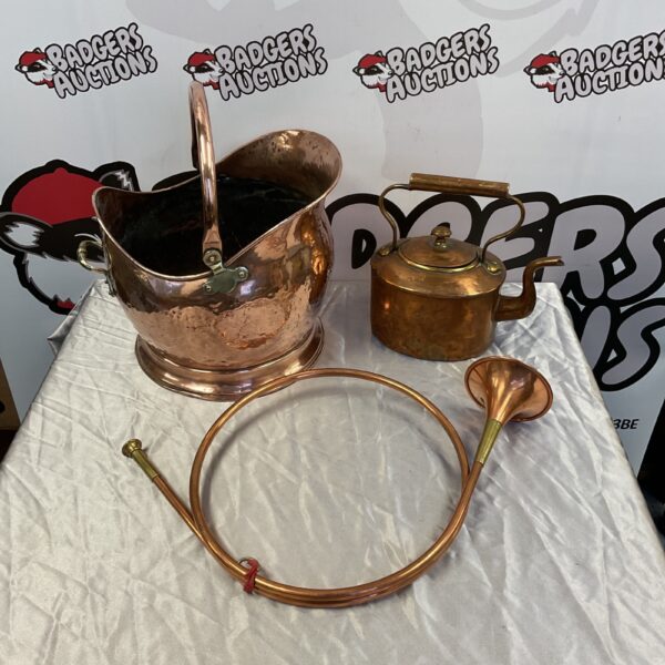 Antique copper coal scuttle with brass horn, Victorian fireplace accessory.