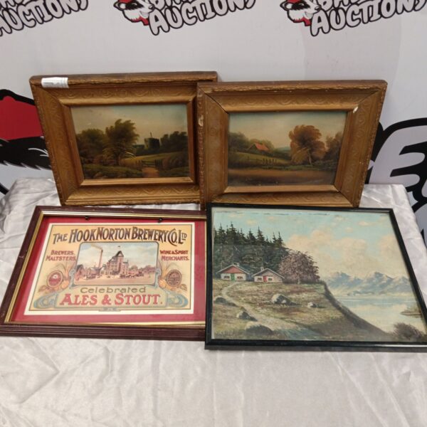 Antique oil painting with a gilt frame depicting a landscape scene.