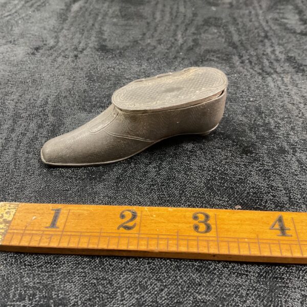Antique pewter snuff box shaped like a shoe, collectible item.
