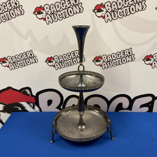 Antique silver plate cake stand with two tiers and trumpet vase.