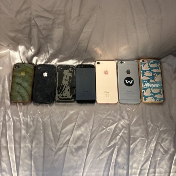 Lot of vintage Apple iPhones for collectors and enthusiasts.