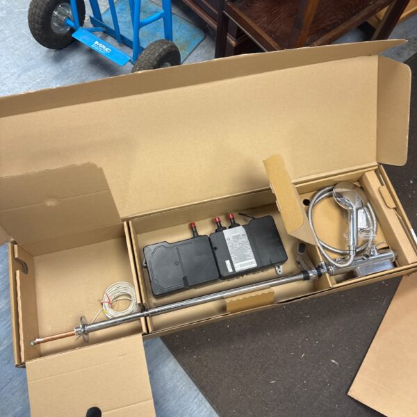 Used Aqualisa Quartz shower system unit with plumbing components.