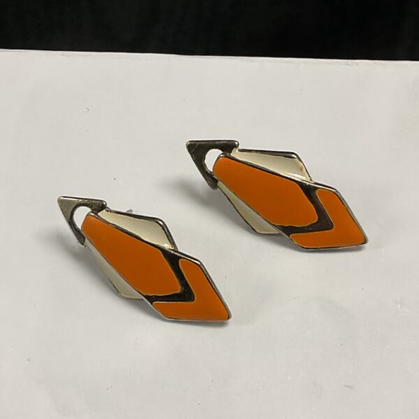 Vintage Art Deco enamel earrings with geometric design.