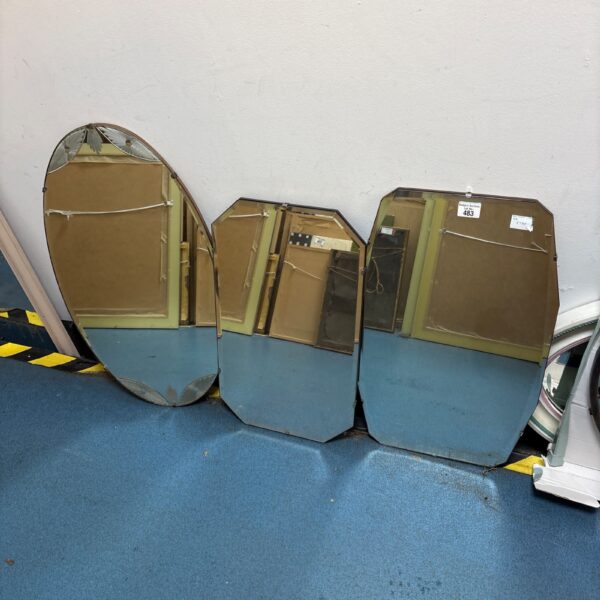 Vintage art deco mirrors with geometric shapes and frameless design.