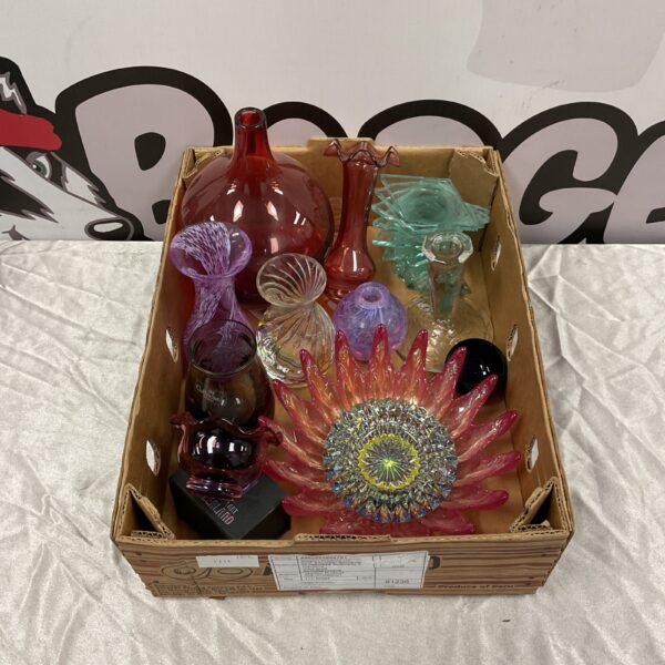 Vibrant art glass collection featuring colourful vases and decorative pieces.