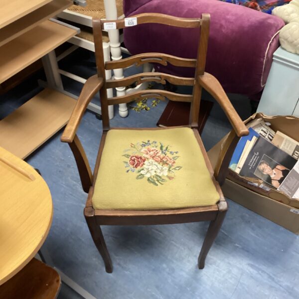 Antique Art Nouveau armchair with floral tapestry seat.