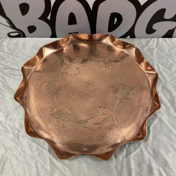 Antique Arts and Crafts copper tray with pie crust edge.