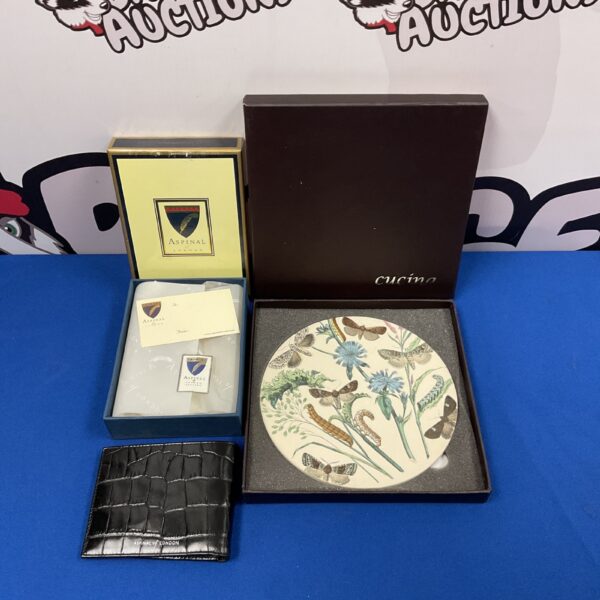 Aspinal of London wallet and Cucina butterfly trivet set.