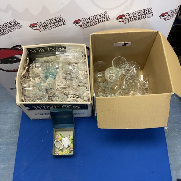Mixed lot of assorted clear glassware, including wine and whiskey glasses.