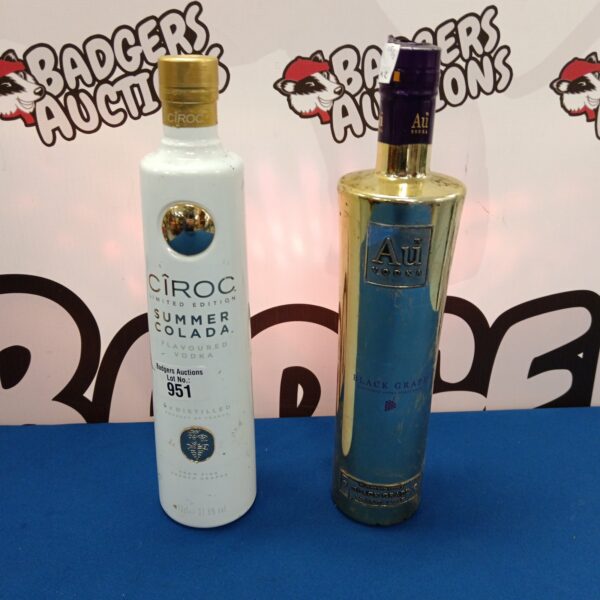 Sealed bottles of au Black Grape and Ciroc Summer Colada vodka.