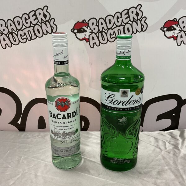 Sealed bottles of Bacardi Carta Blanca and Gordon's Gin for collectors.