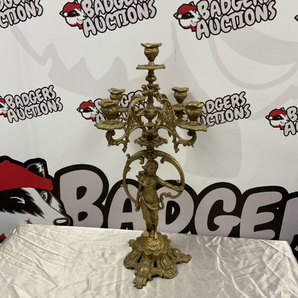 Ornate baroque brass candelabra with five arms for candles.