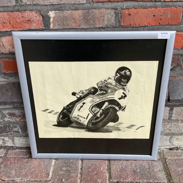 Vintage print of Barry Sheene racing a Suzuki motorcycle.