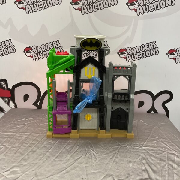 Front view of the Batman Batcave playset, a detailed toy.