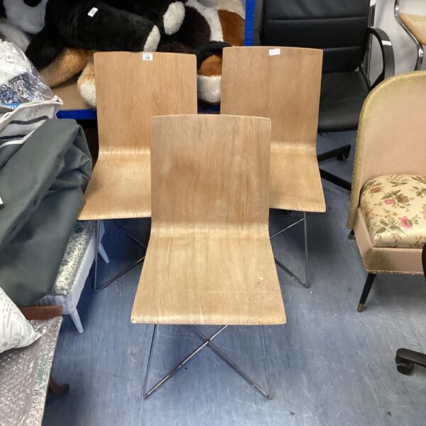Vintage bentwood chair set with warm wood tones.