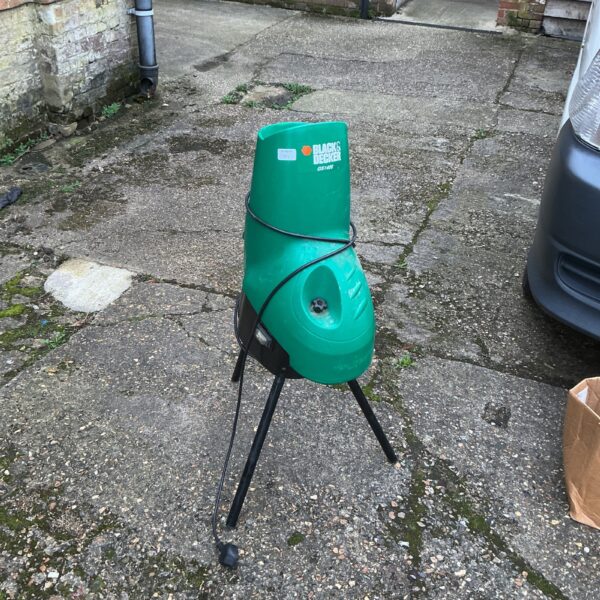 Used Black and Decker garden shredder for garden waste reduction.