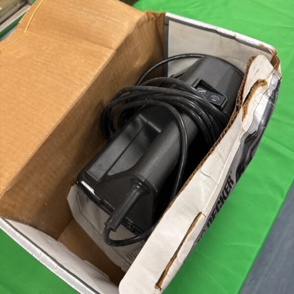Black & Decker wallpaper stripper in cardboard box.