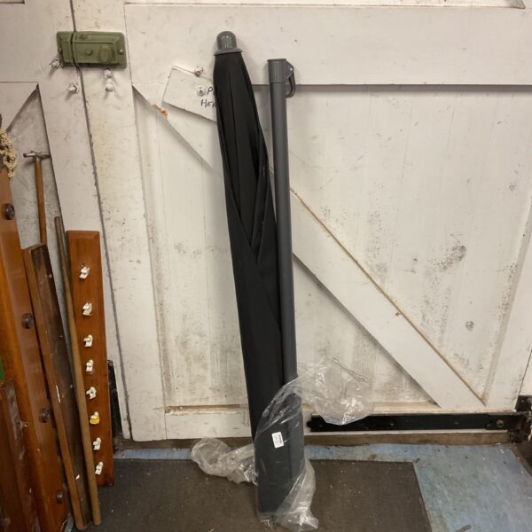 New black garden umbrella for outdoor patio shade.