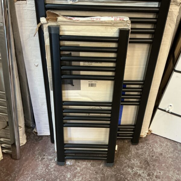 Black ladder radiator measuring 700x300mm for central heating.