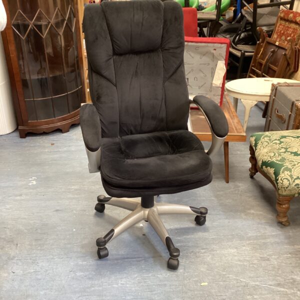 Black office swivel chair with high back and adjustable height.