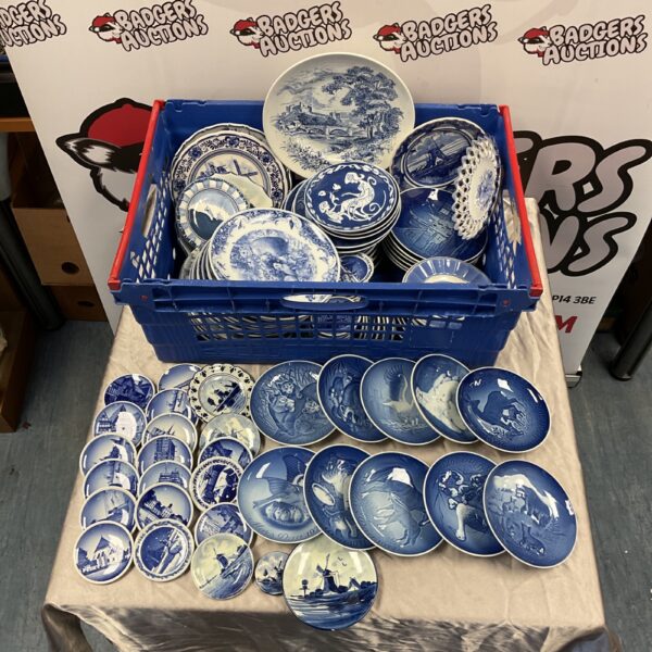 Large lot of vintage blue and white china plates for collectors.