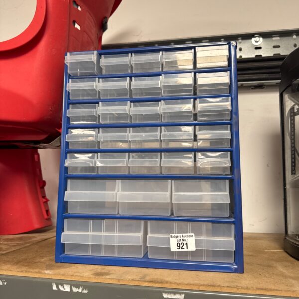 Blue plastic multi-drawer organiser for small parts storage.