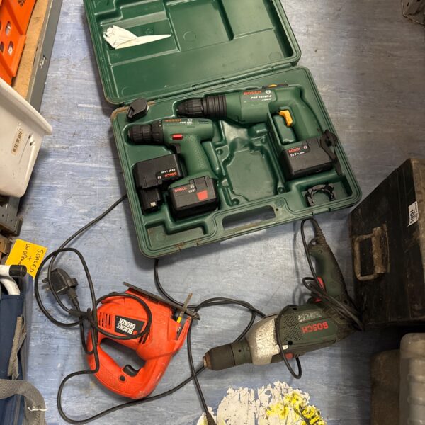 Untested Bosch cordless drill in black and teal.