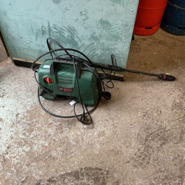 Used Bosch power washer for garden and patio cleaning.