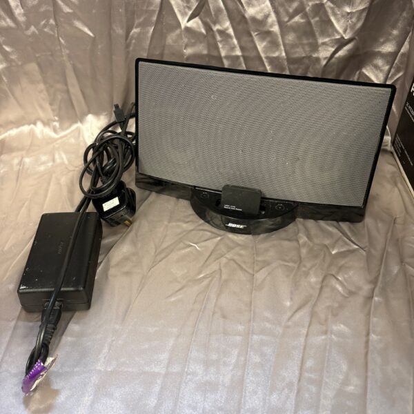 Bose SoundDock digital music system with power adapter.