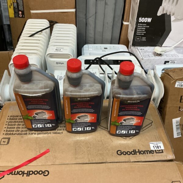 Three bottles of Bostik concentrated mortar plasticiser for construction.
