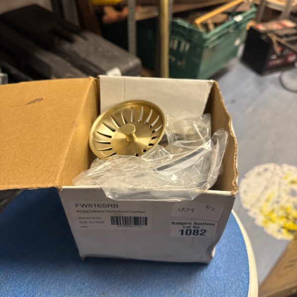 Brass effect basket strainer waste with round overflow.