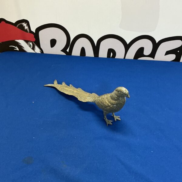 Detailed vintage brass pheasant sculpture for home decor.