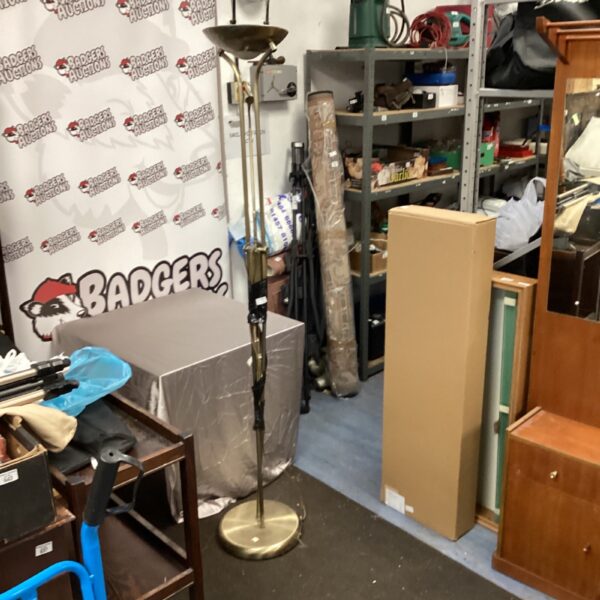 Vintage brass standard lamp with adjustable reading light.