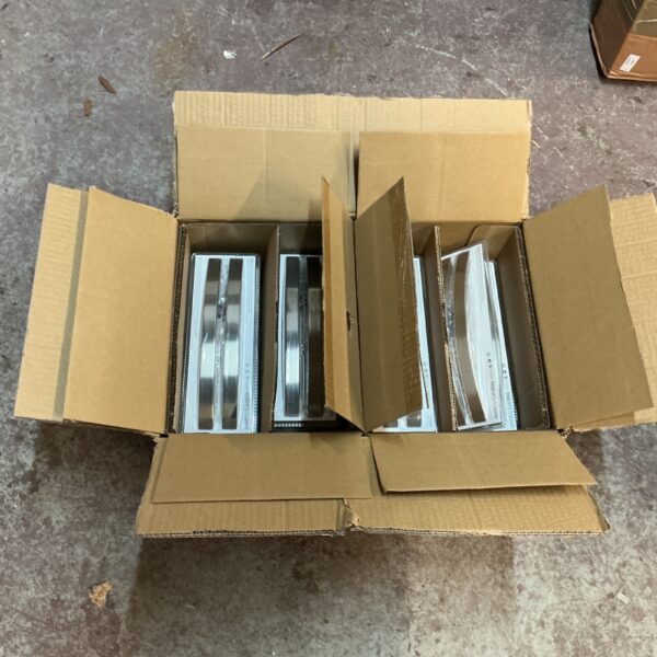 Two boxes of brushed steel handles for home improvement.