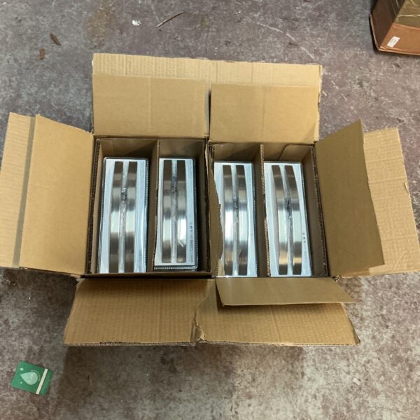Two boxes of brushed steel handles for home improvement projects.