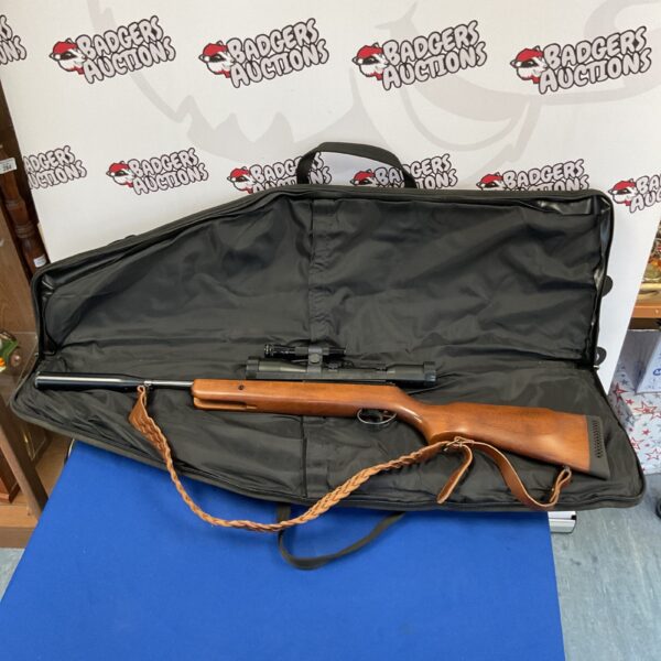 BSA Sportsman .22 rifle in a carry case with scope and suppressor.