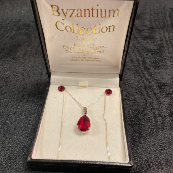 Silver necklace and earrings set with Swarovski Elements crystals.