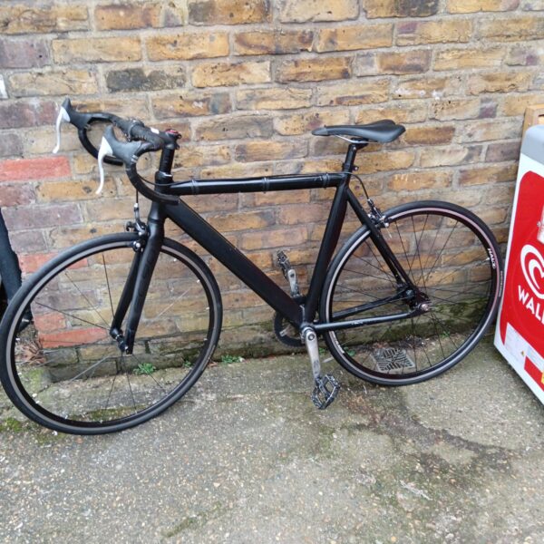 Carbon fibre racing bike with Shimano brakes for sale.