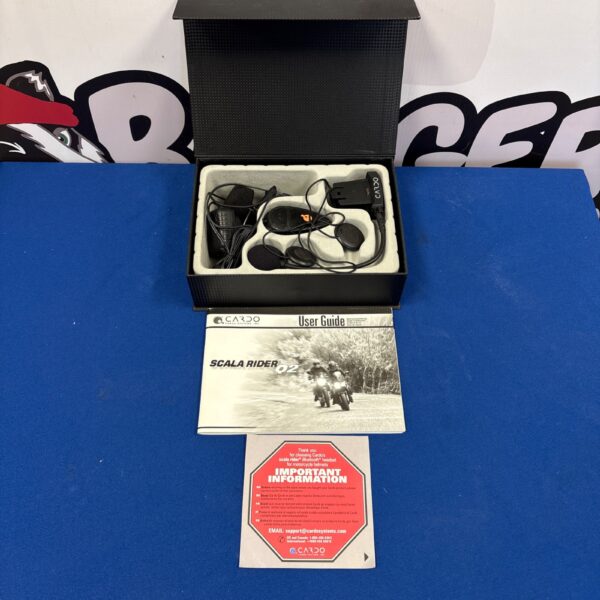 Cardo Scala Rider Q2 motorcycle communication system in packaging.