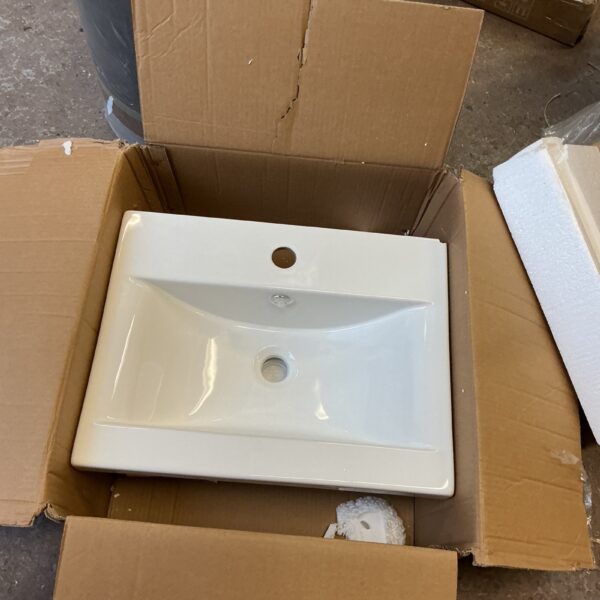 White ceramic wash basin for bathroom renovation project.