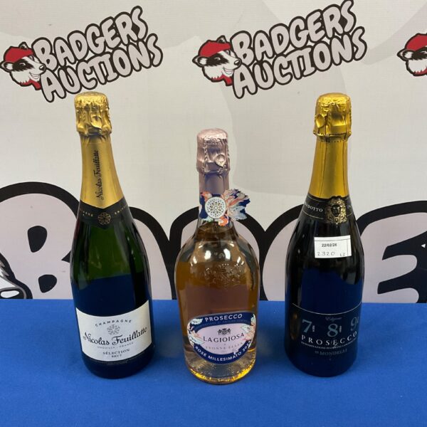 Champagne and Prosecco lot featuring Nicolas Feuillatte and Lagioiosa bottles.