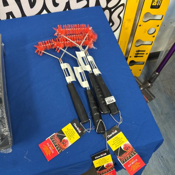 Lot of four new Charbroil BBQ cleaning brushes for grill maintenance.