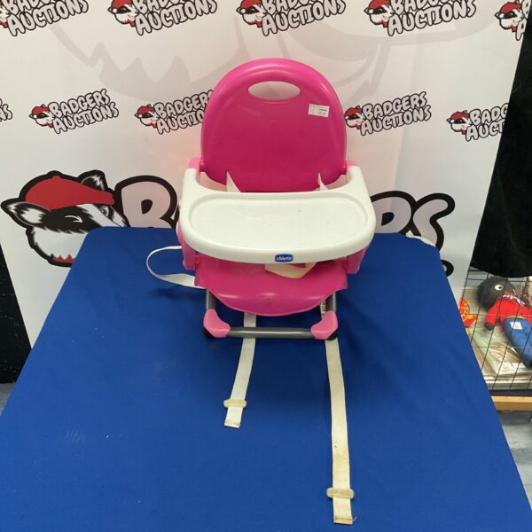 Front view of a used Chicco child seat for toddlers.