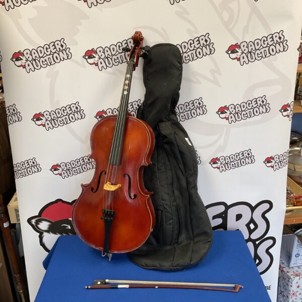 Hungarian child’s cello with bow and soft case.